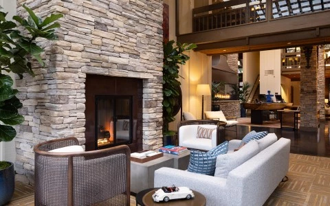 a living room with a fireplace and a couch